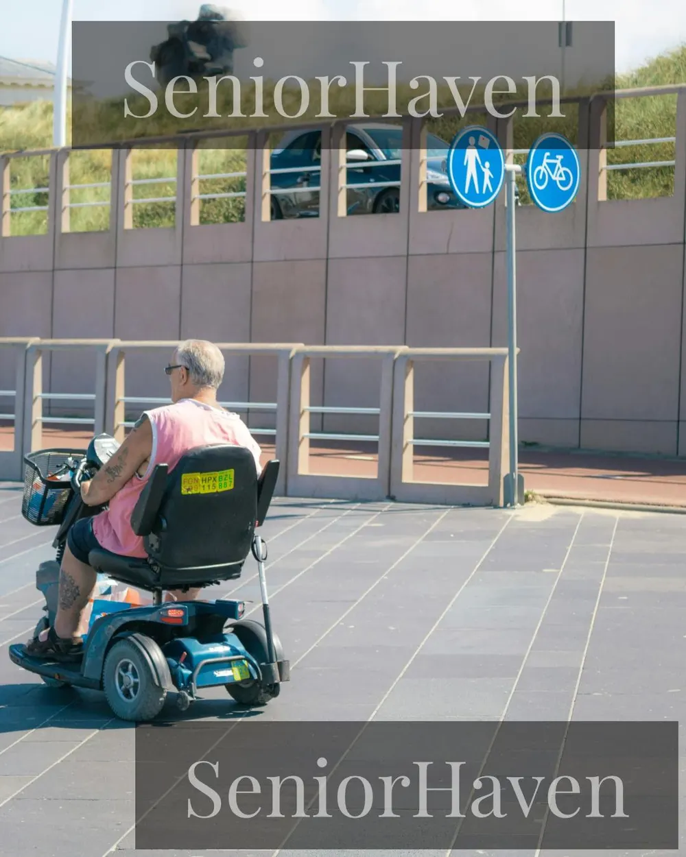 A person riding a mobility scooter on a smooth paved outdoor path