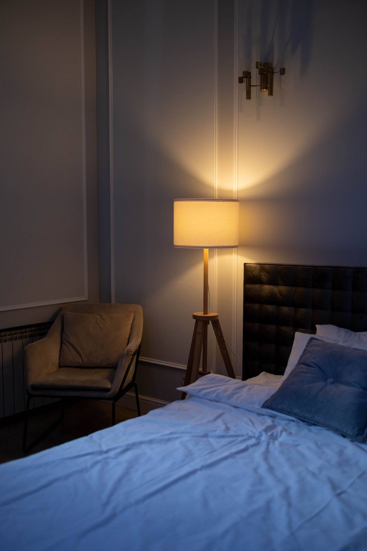 A warm, tidy bedroom made safe and comfortable for a senior