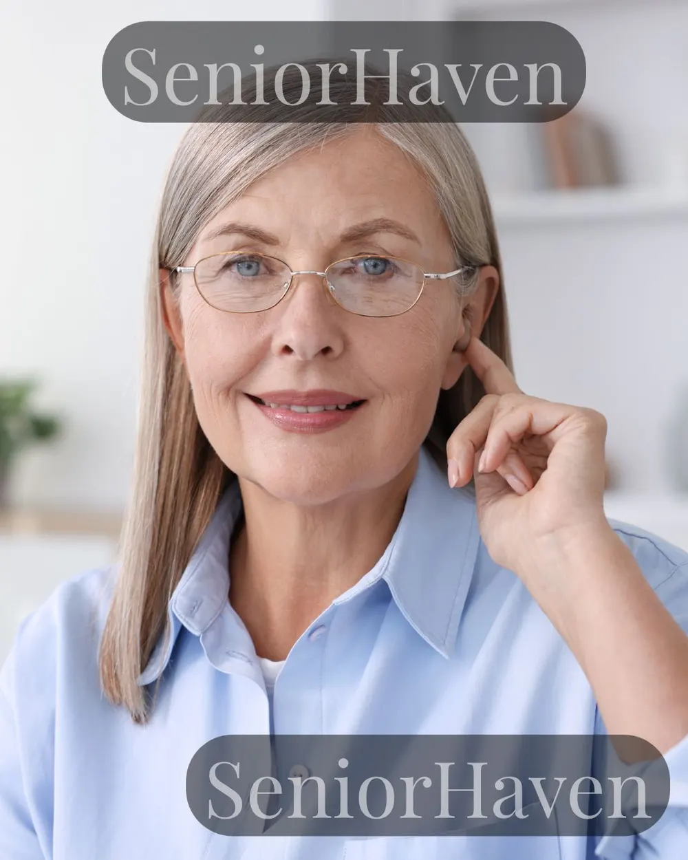 A smiling senior woman at home with her hand at her ear