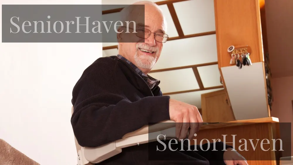 A smiling senior seated on a stairlift chair in a home interior