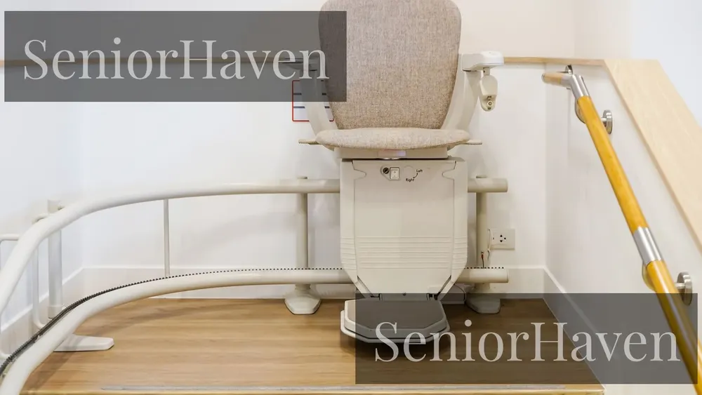 A stairlift seat at the top landing, facing out onto the landing, with a curved rail behind it